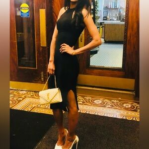 Elegant Black slimming, and figure hugging Sleeveless Dress